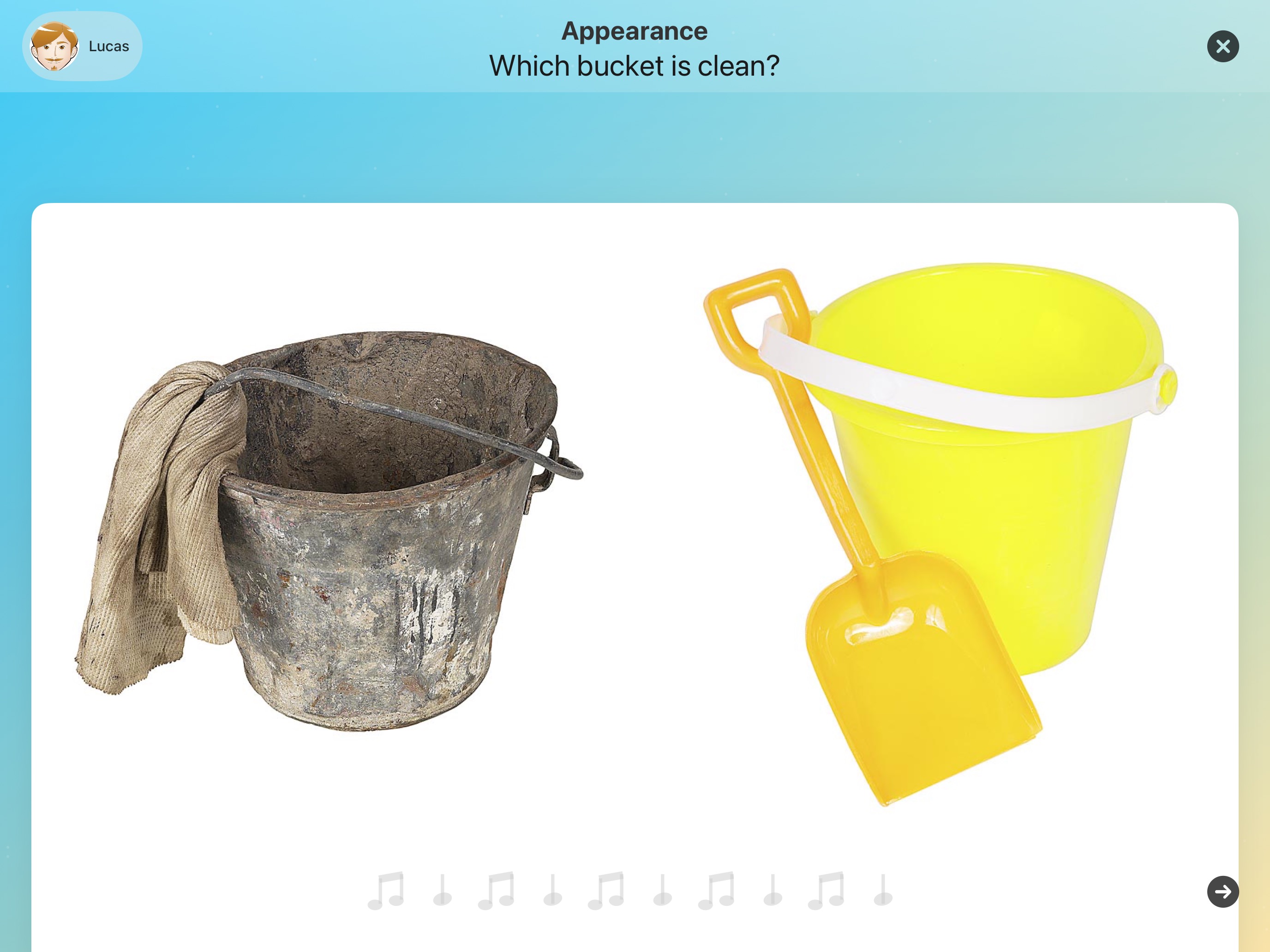 Adjective Remix asks: Which bucket is clean? A dirty metal bucket and a clean yellow bucket